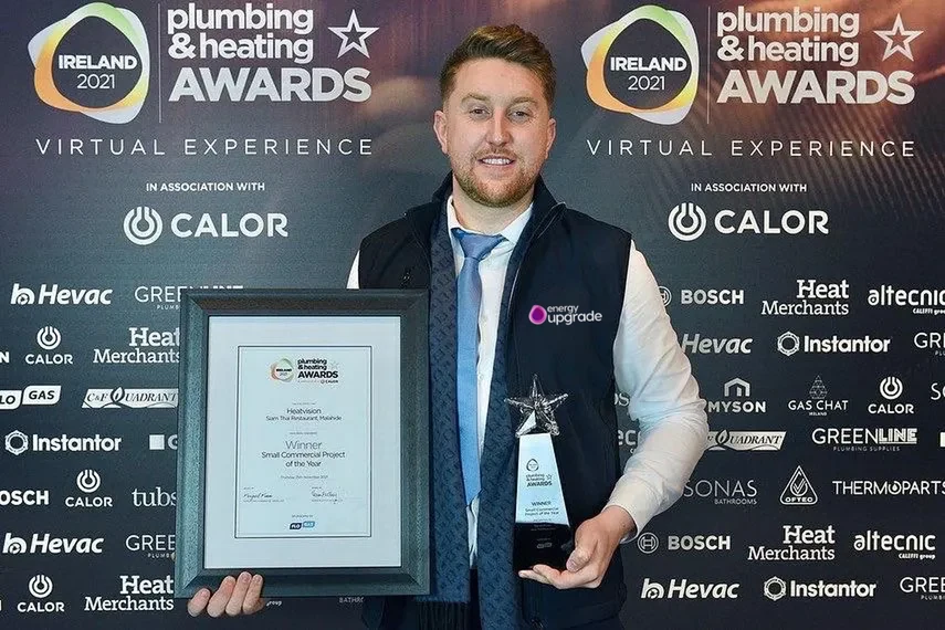 Holding the trophy and the Small Commercial Project of the Year certificate at the Plumbing & Heating Awards Ireland 2021